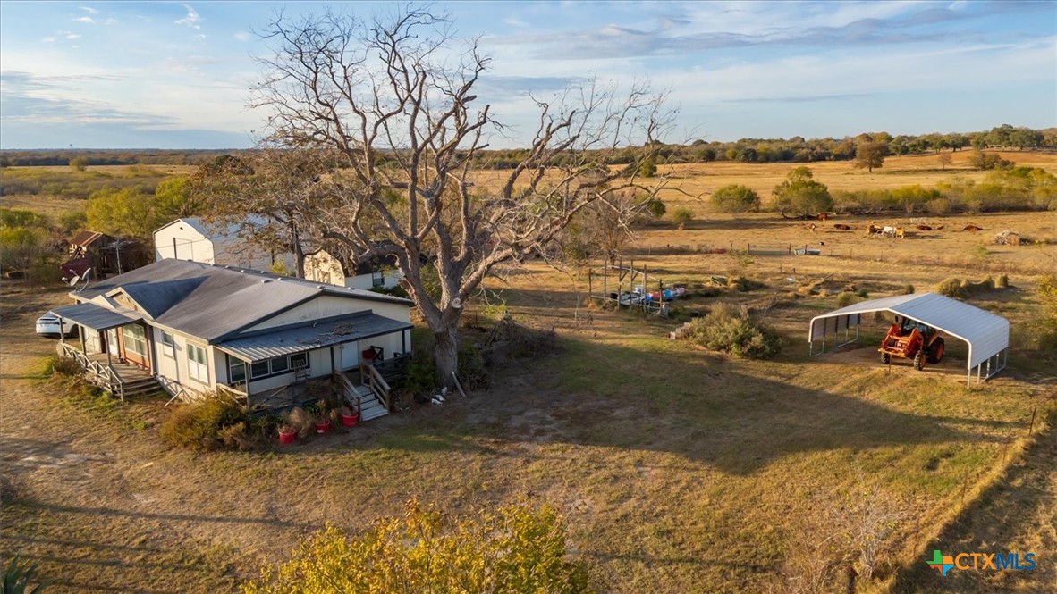 14858 Farm To Market Road 1322 Luling, TX 78648 - Photo 31 of 40 a view of a house with a yard