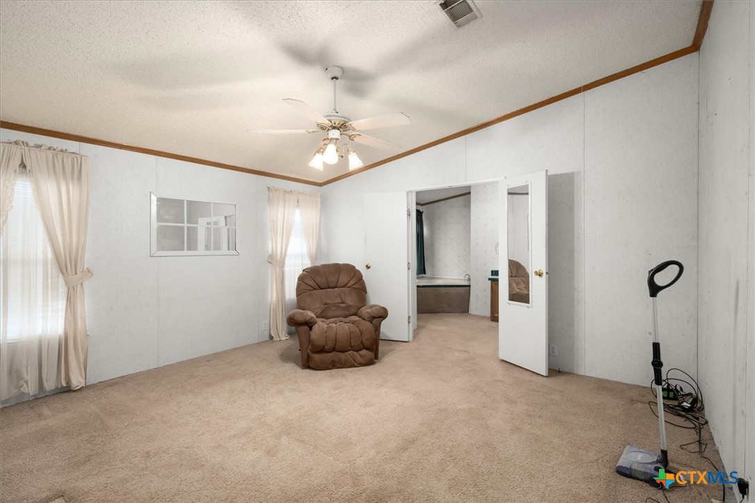 14858 Farm To Market Road 1322 Luling, TX 78648 - Photo 9 of 40 a living room with furniture and a window