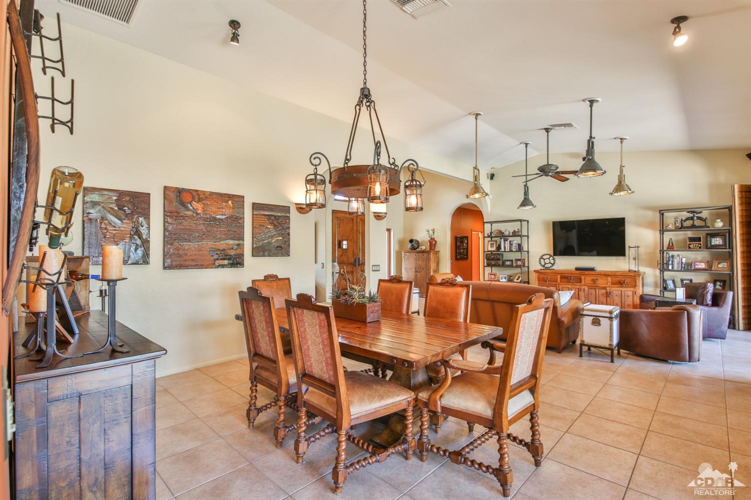 72187 Rancho Road Rancho Mirage, CA 92270 - Photo 14 of 25 a view of a dining room with furniture