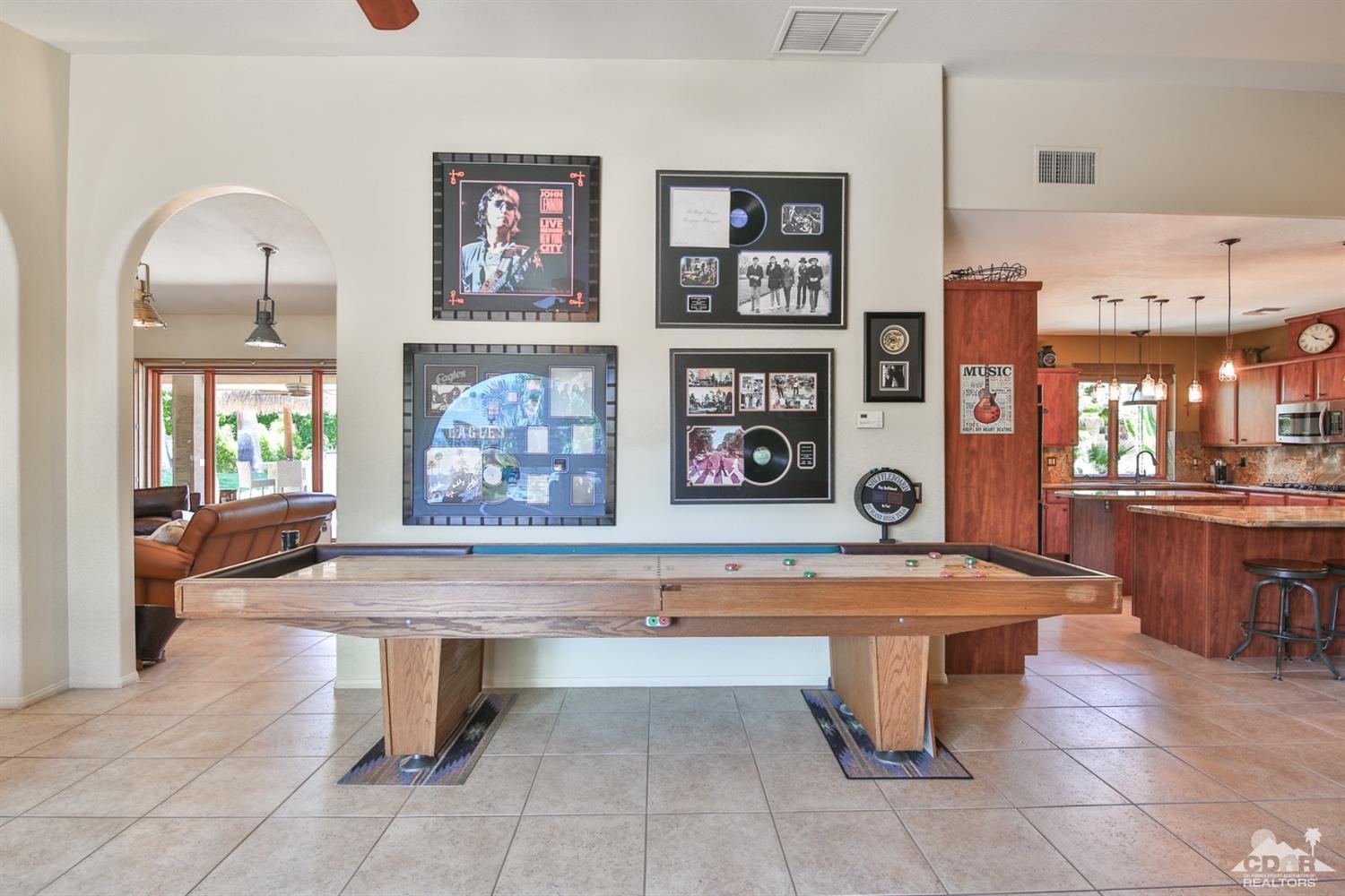 72187 Rancho Road Rancho Mirage, CA 92270 - Photo 15 of 25 a room with pool table and windows