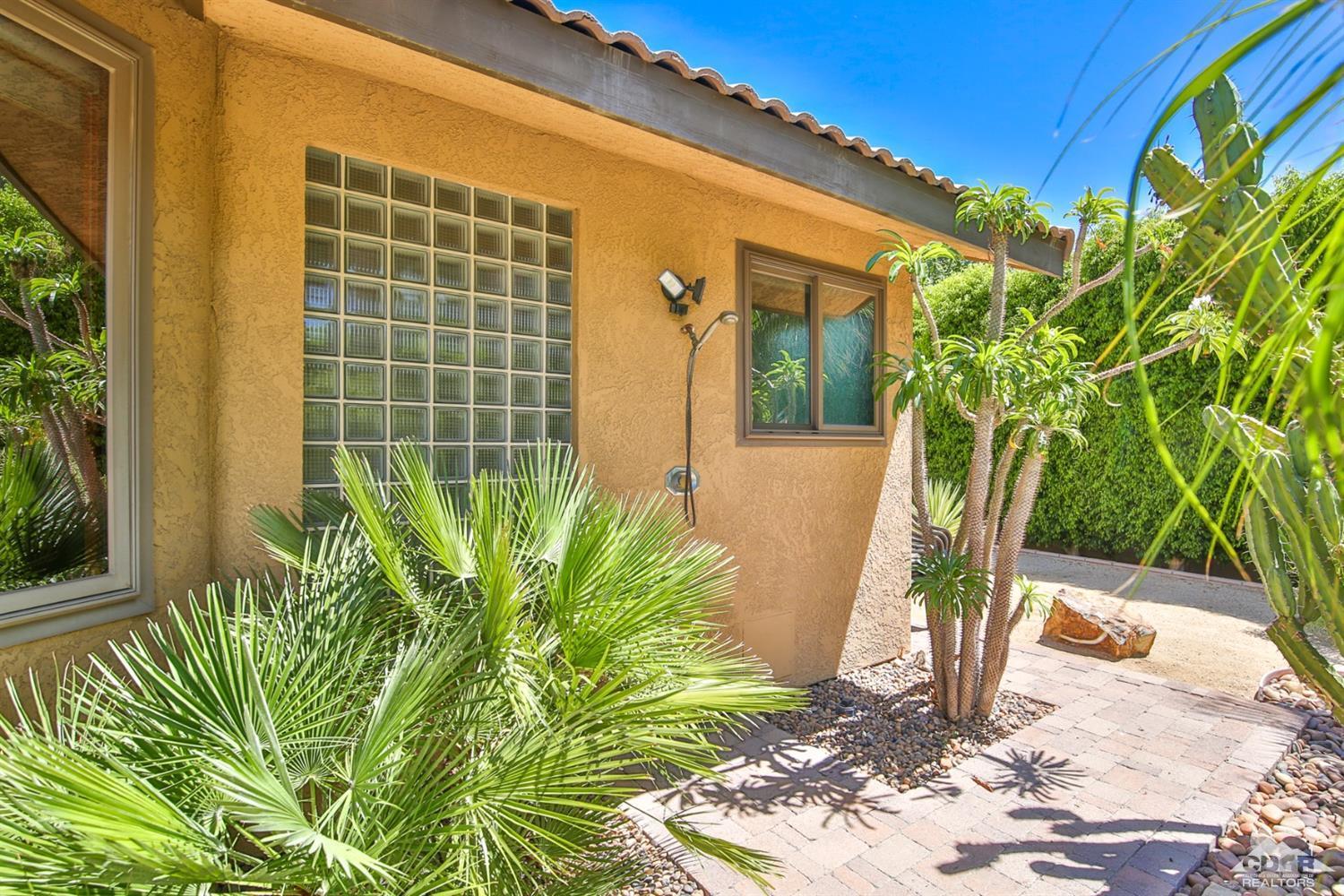 72187 Rancho Road Rancho Mirage, CA 92270 - Photo 24 of 25 a view of a potted plants in front of a house