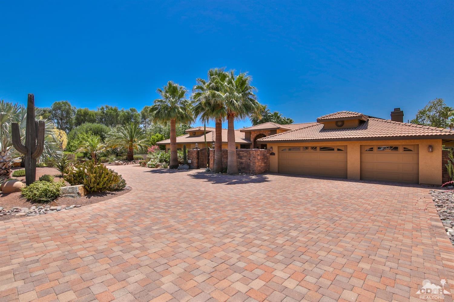 72187 Rancho Road Rancho Mirage, CA 92270 - Photo 4 of 25 a view of a terrace with a garden