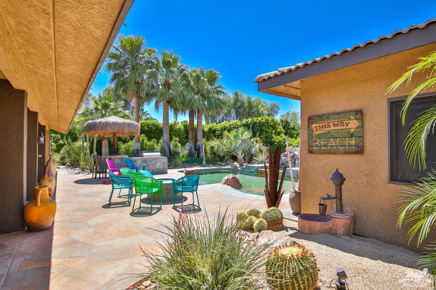 72187 Rancho Road Rancho Mirage, CA 92270 - Photo 6 of 25 a view of a chairs and table in patio