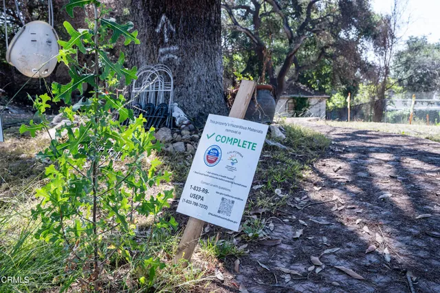 a sign on the side of the road