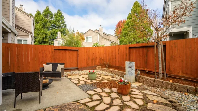 a view of a lounge chair in the back of a building