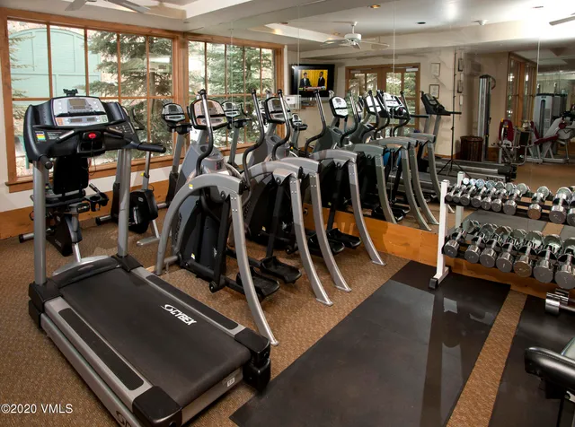 a view of a room with gym equipment