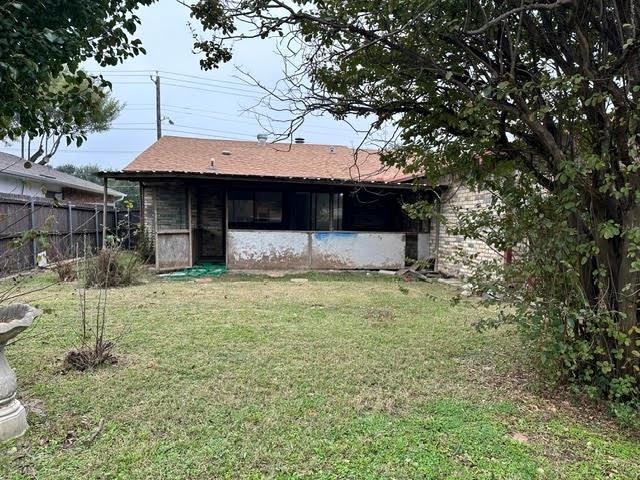 3413 Apollo Road Garland, TX 75044 - Photo 7 of 19 a view of a house with a yard