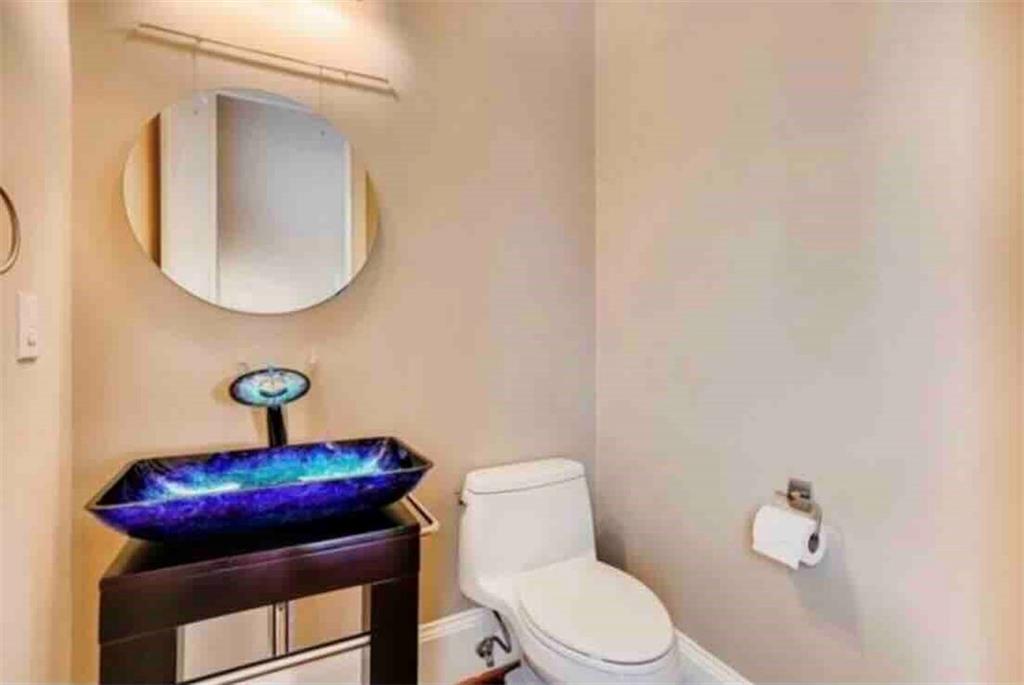 384 16th Street Northwest, Unit 1 Atlanta, GA 30363 - Photo 11 of 31 a bathroom with a toilet and a sink