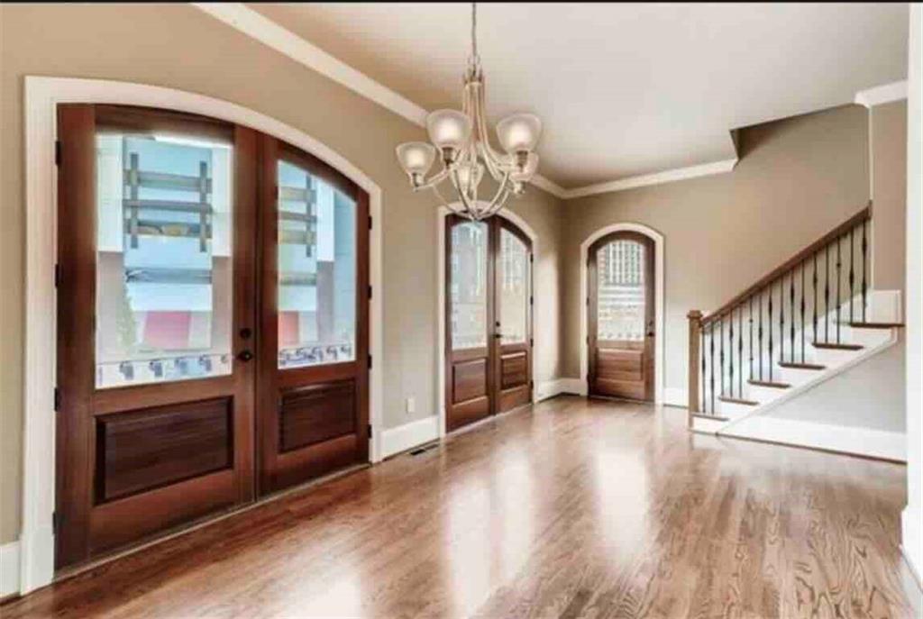 384 16th Street Northwest, Unit 1 Atlanta, GA 30363 - Photo 12 of 31 a view of a livingroom with wooden floor and staircase