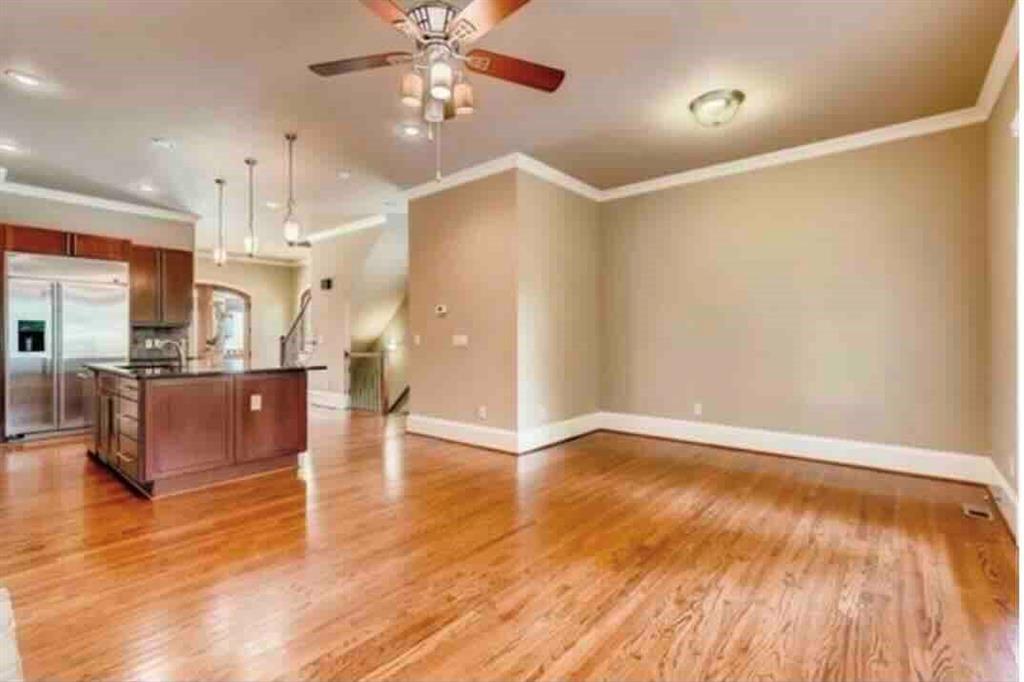 384 16th Street Northwest, Unit 1 Atlanta, GA 30363 - Photo 18 of 31 a view of kitchen and hall with wooden floor