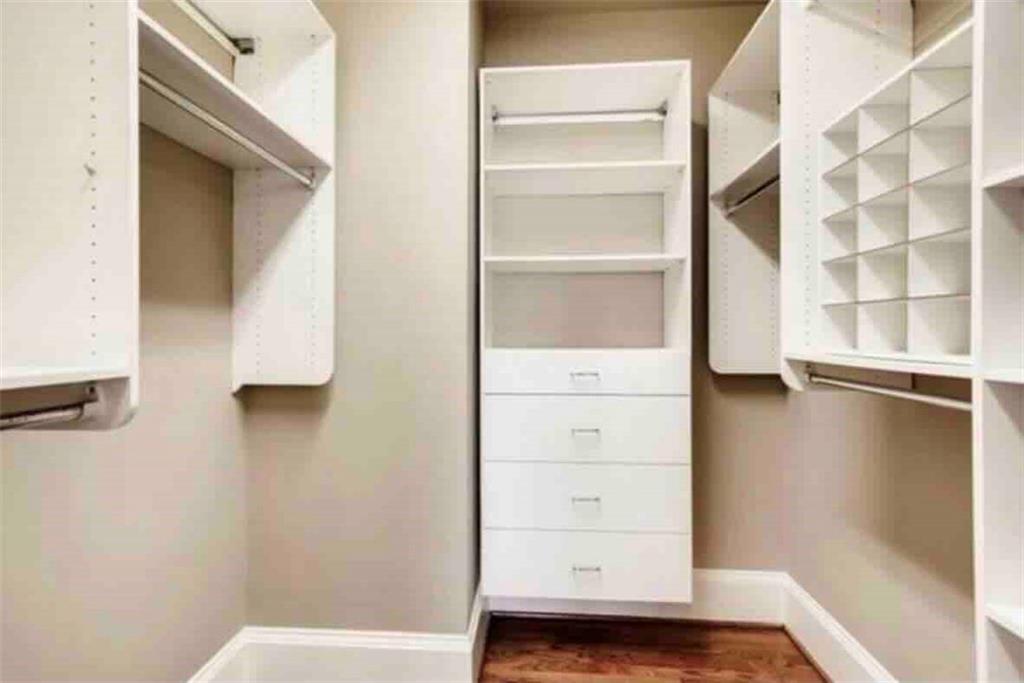 384 16th Street Northwest, Unit 1 Atlanta, GA 30363 - Photo 24 of 31 a view of walk in closet with empty racks