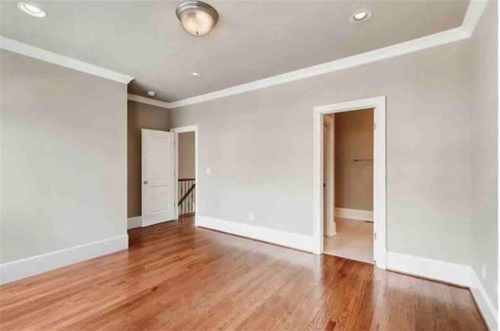 384 16th Street Northwest, Unit 1 Atlanta, GA 30363 - Photo 25 of 31 a view of an empty room with wooden floor