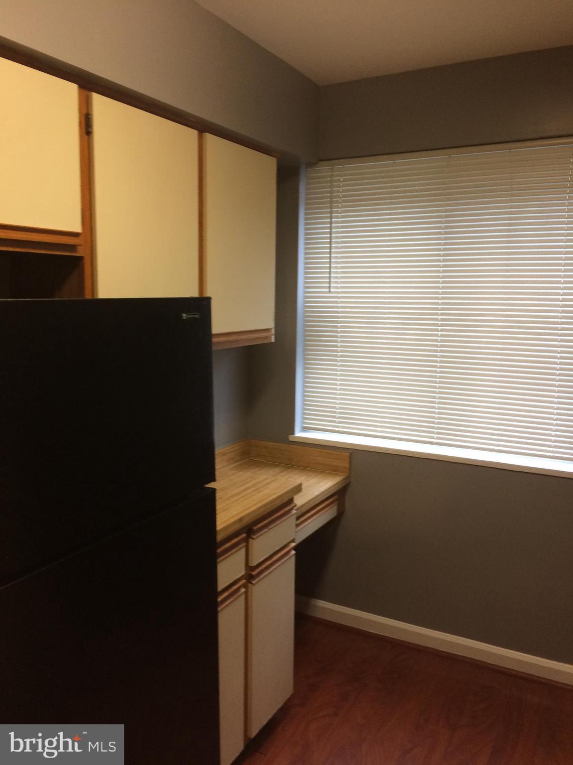 4721 1st Street Southwest, Unit 101 Washington, DC 20032 - Photo 11 of 12 a room with a window