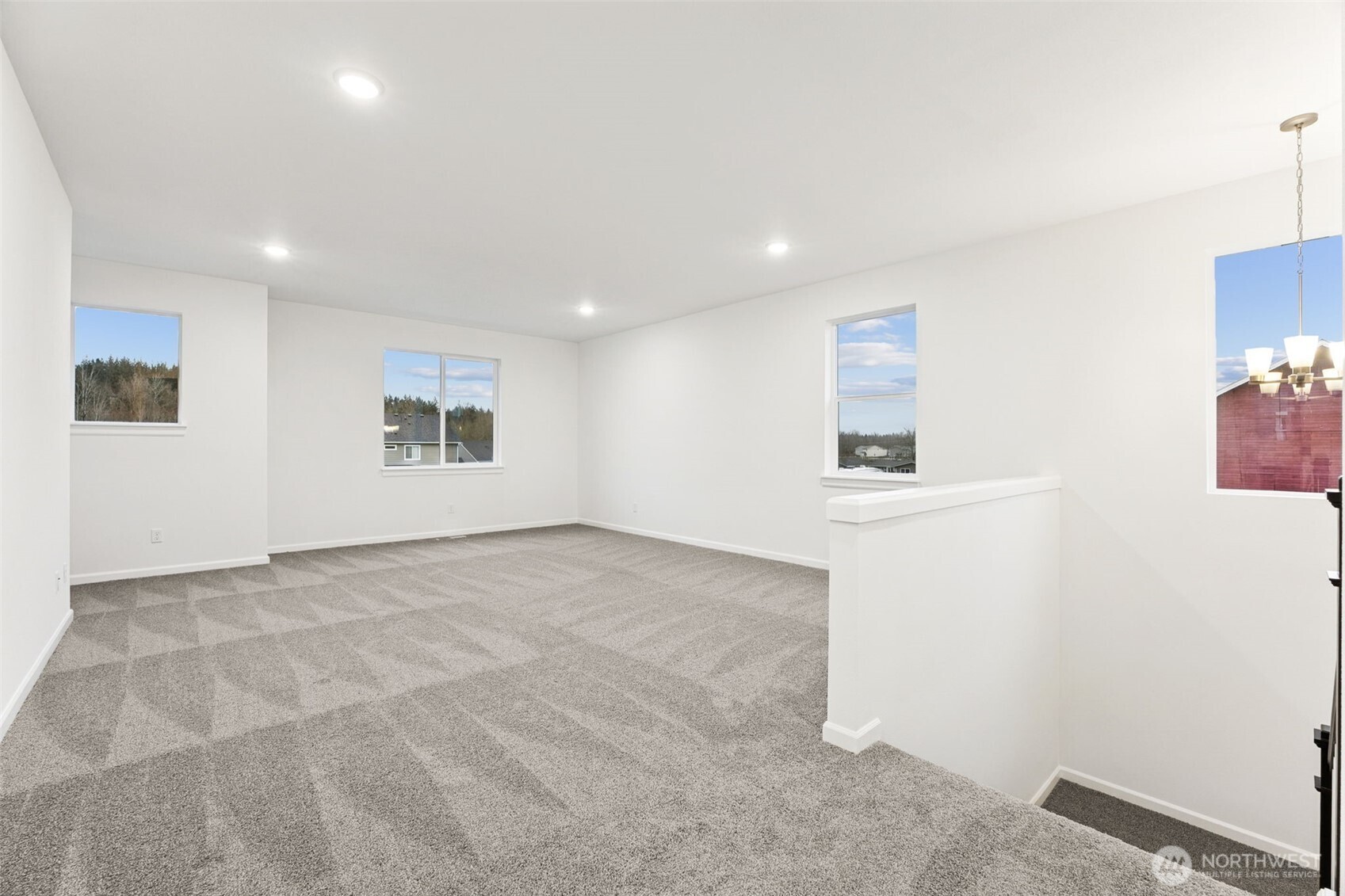984 Tanner Avenue, Unit 101 Buckley, WA 98321 - Photo 11 of 17 a view of empty room with windows
