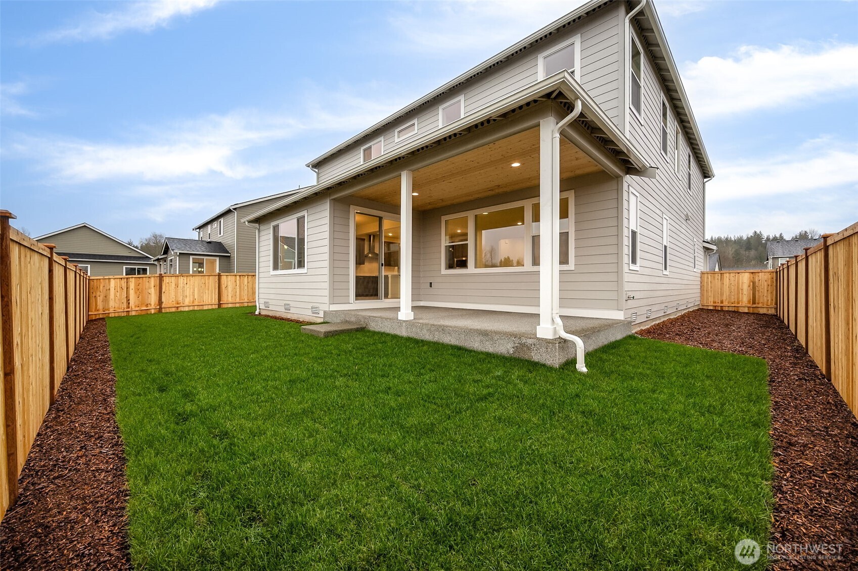 984 Tanner Avenue, Unit 101 Buckley, WA 98321 - Photo 17 of 17 a view of a house with a yard