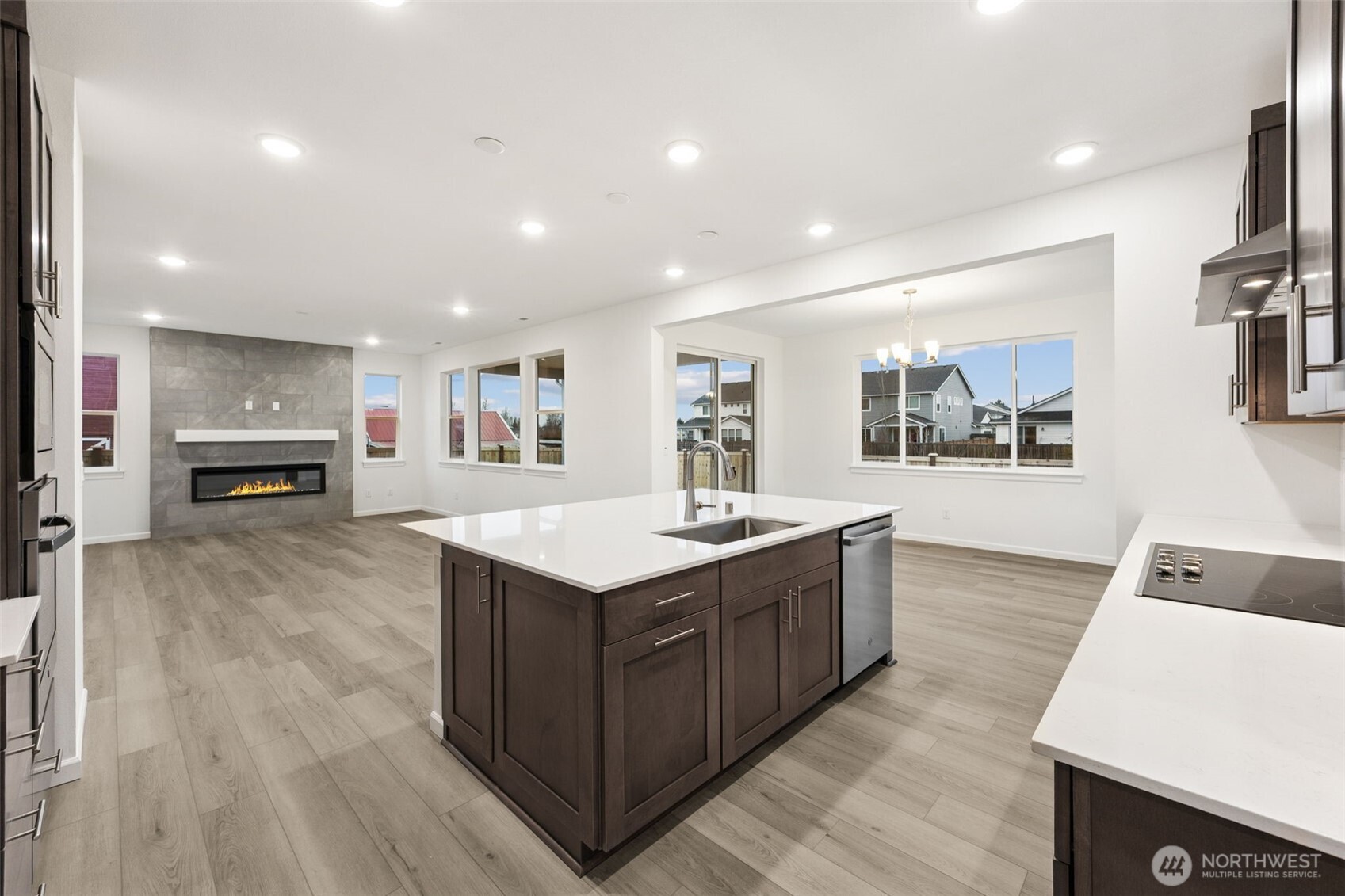 984 Tanner Avenue, Unit 101 Buckley, WA 98321 - Photo 8 of 17 a kitchen with a stove and a refrigerator