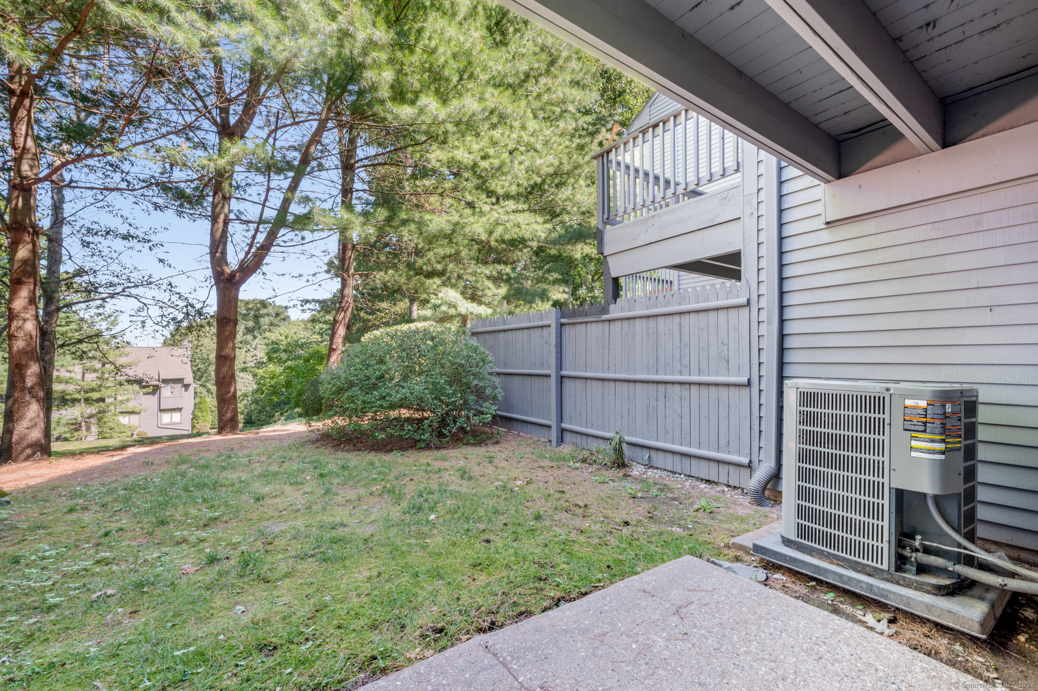 250 Conestoga Way, Unit 250 Glastonbury, CT 06033 - Photo 34 of 37 a view of a backyard