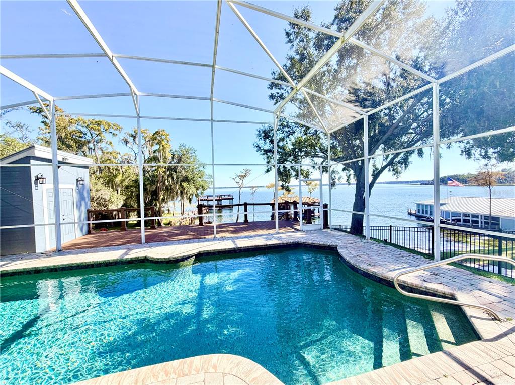 5243 West Lake Butler Road Windermere, FL 34786 - Photo 42 of 43 a view of a swimming pool with a patio