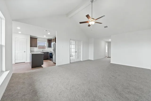 a view of a kitchen with a sink and cabinet area