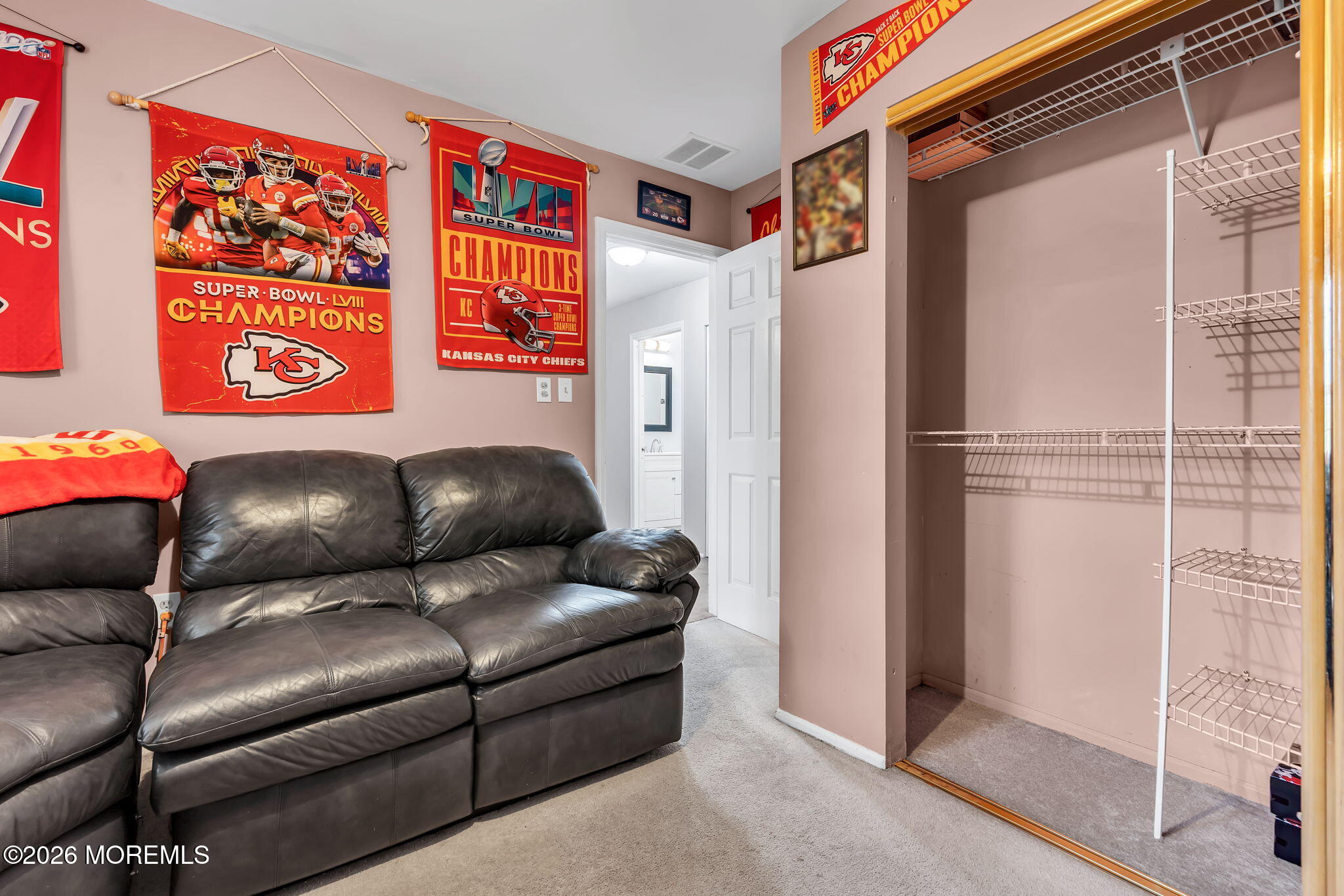 96 Yellowbank Road Toms River, NJ 08753 - Photo 39 of 45 a projector room with a couch and a table