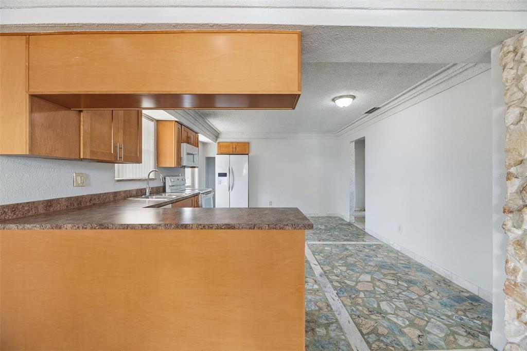 5735 Hayes Street Hollywood, FL 33021 - Photo 13 of 40 a view of a kitchen counter top space