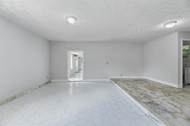 an empty room with a workbench