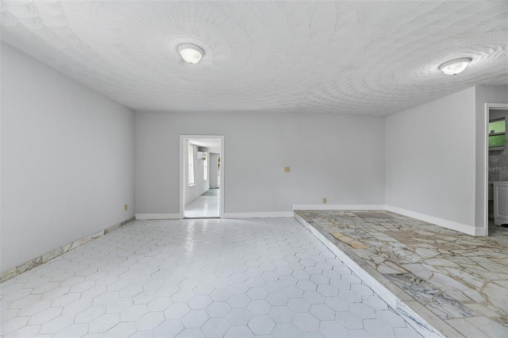 5735 Hayes Street Hollywood, FL 33021 - Photo 20 of 40 an empty room with a workbench