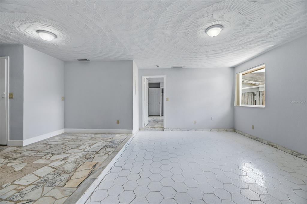 5735 Hayes Street Hollywood, FL 33021 - Photo 21 of 40 a view of an empty room and window