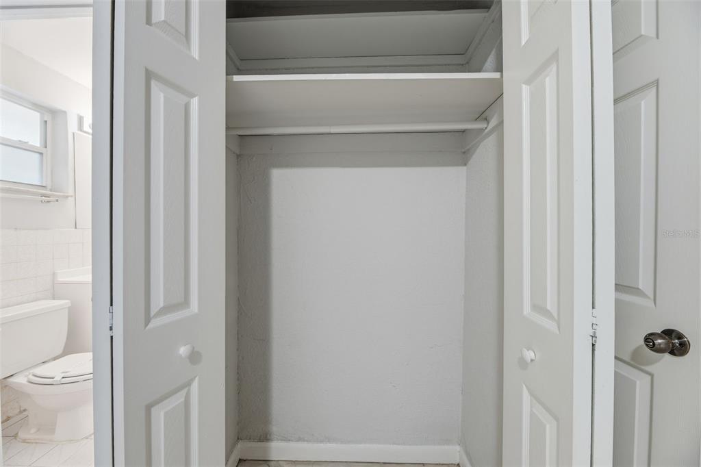 5735 Hayes Street Hollywood, FL 33021 - Photo 22 of 40 a bathroom with a toilet and a shower