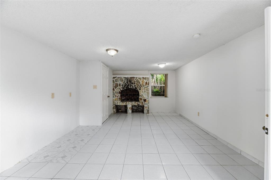 5735 Hayes Street Hollywood, FL 33021 - Photo 31 of 40 an empty room with furniture and white walls