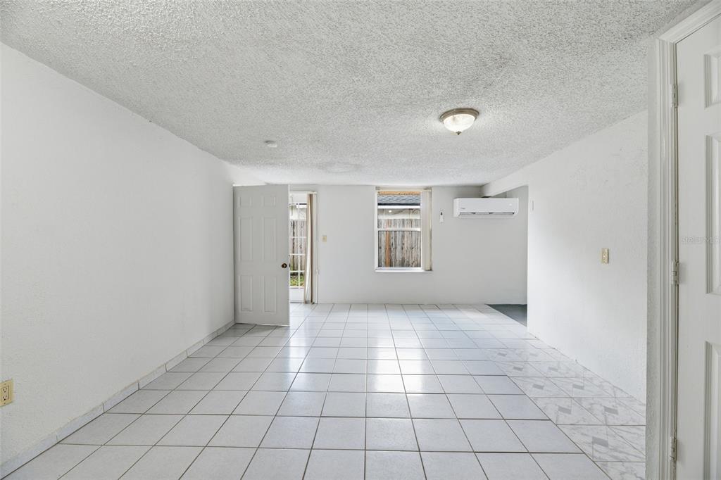 5735 Hayes Street Hollywood, FL 33021 - Photo 32 of 40 a view of an empty room with a window