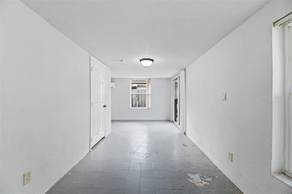 5735 Hayes Street Hollywood, FL 33021 - Photo 34 of 40 a view of a big room with closet and windows