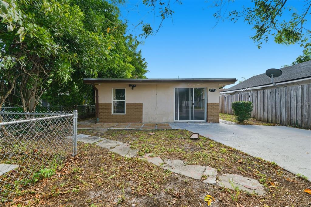 5735 Hayes Street Hollywood, FL 33021 - Photo 37 of 40 a view of a house with backyard and sitting area