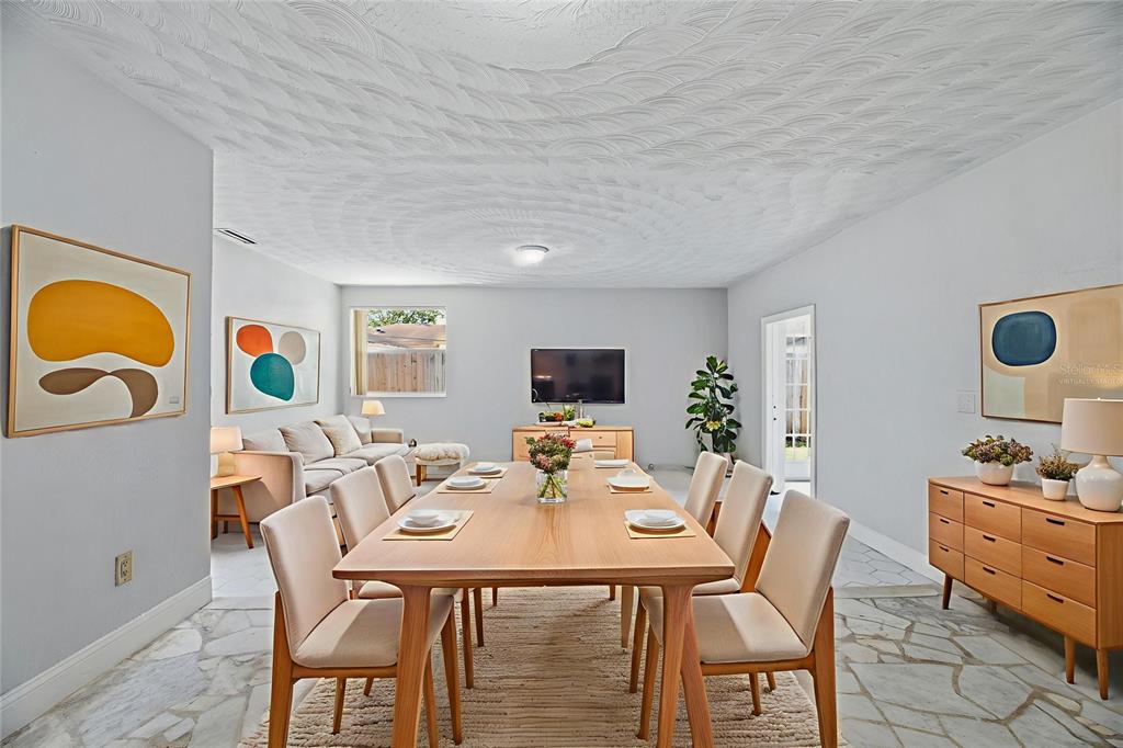 5735 Hayes Street Hollywood, FL 33021 - Photo 4 of 40 a dining room with furniture and window