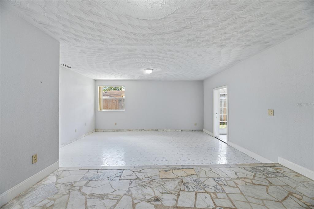 5735 Hayes Street Hollywood, FL 33021 - Photo 5 of 40 a view of an empty room