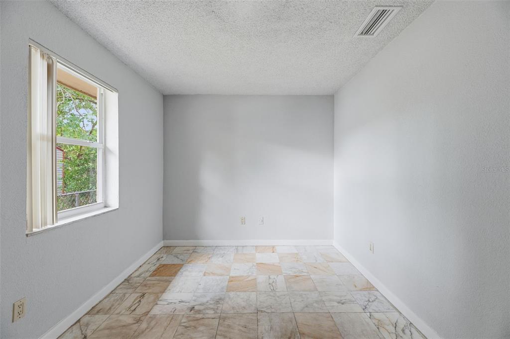 5735 Hayes Street Hollywood, FL 33021 - Photo 7 of 40 a view of a room that has a window in it