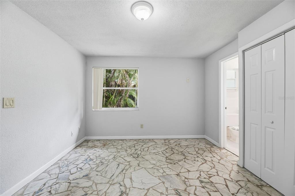 5735 Hayes Street Hollywood, FL 33021 - Photo 9 of 40 an empty room with windows