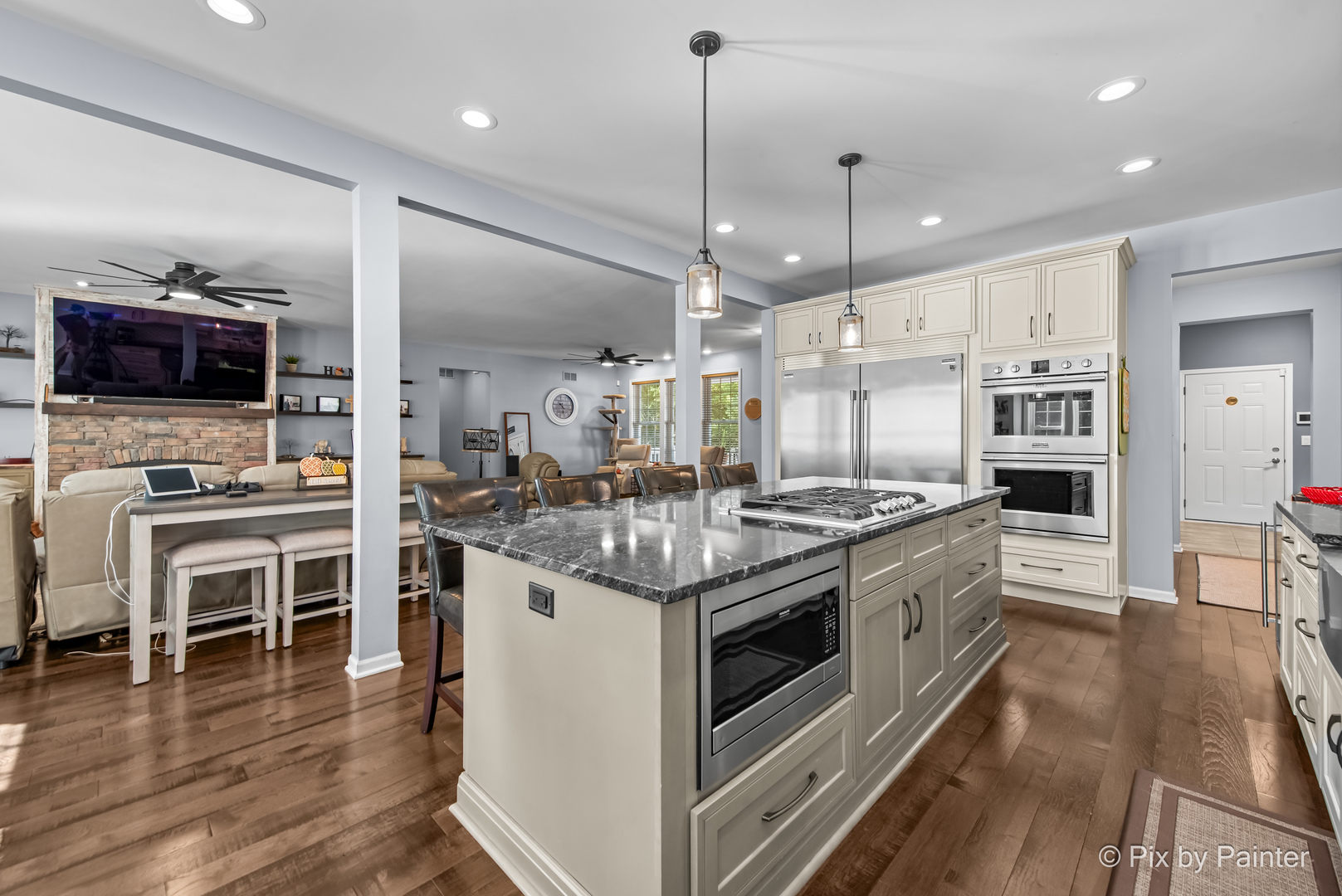 39247 Rangers Way Antioch, IL 60002 - Photo 18 of 53 a kitchen with stainless steel appliances granite countertop a stove oven and a refrigerator