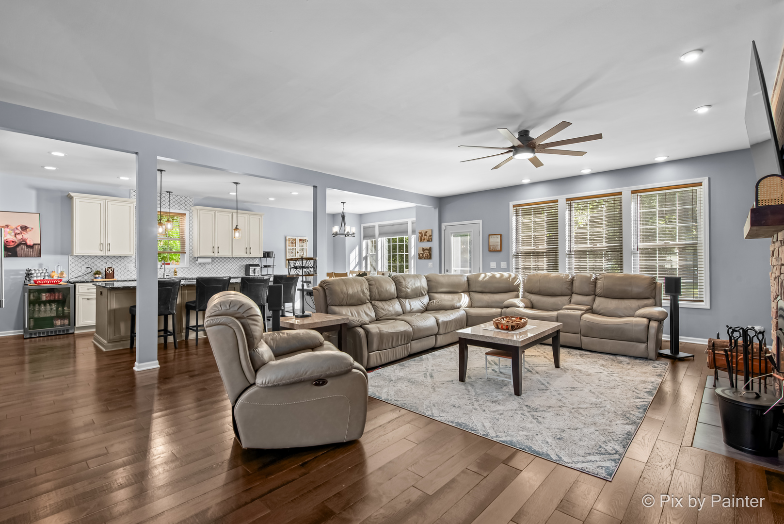 39247 Rangers Way Antioch, IL 60002 - Photo 20 of 53 a living room with furniture wooden floor and a large window