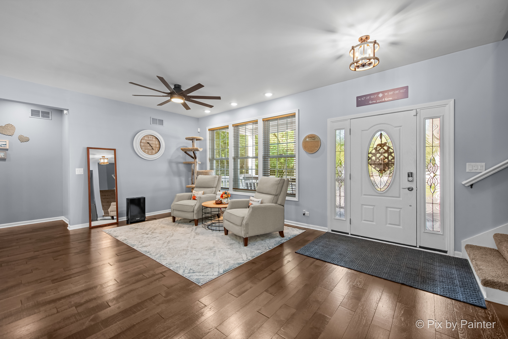 39247 Rangers Way Antioch, IL 60002 - Photo 22 of 53 a living room with furniture and wooden floor