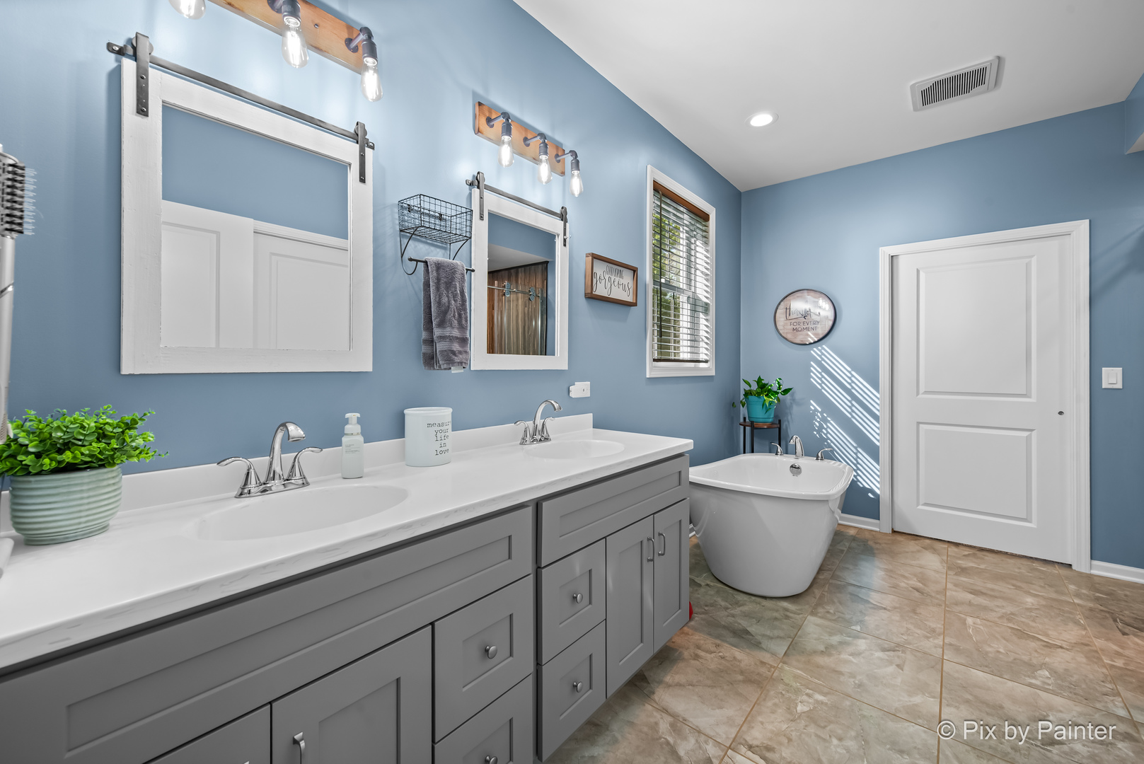 39247 Rangers Way Antioch, IL 60002 - Photo 25 of 53 a spacious bathroom with a granite countertop sink and mirror