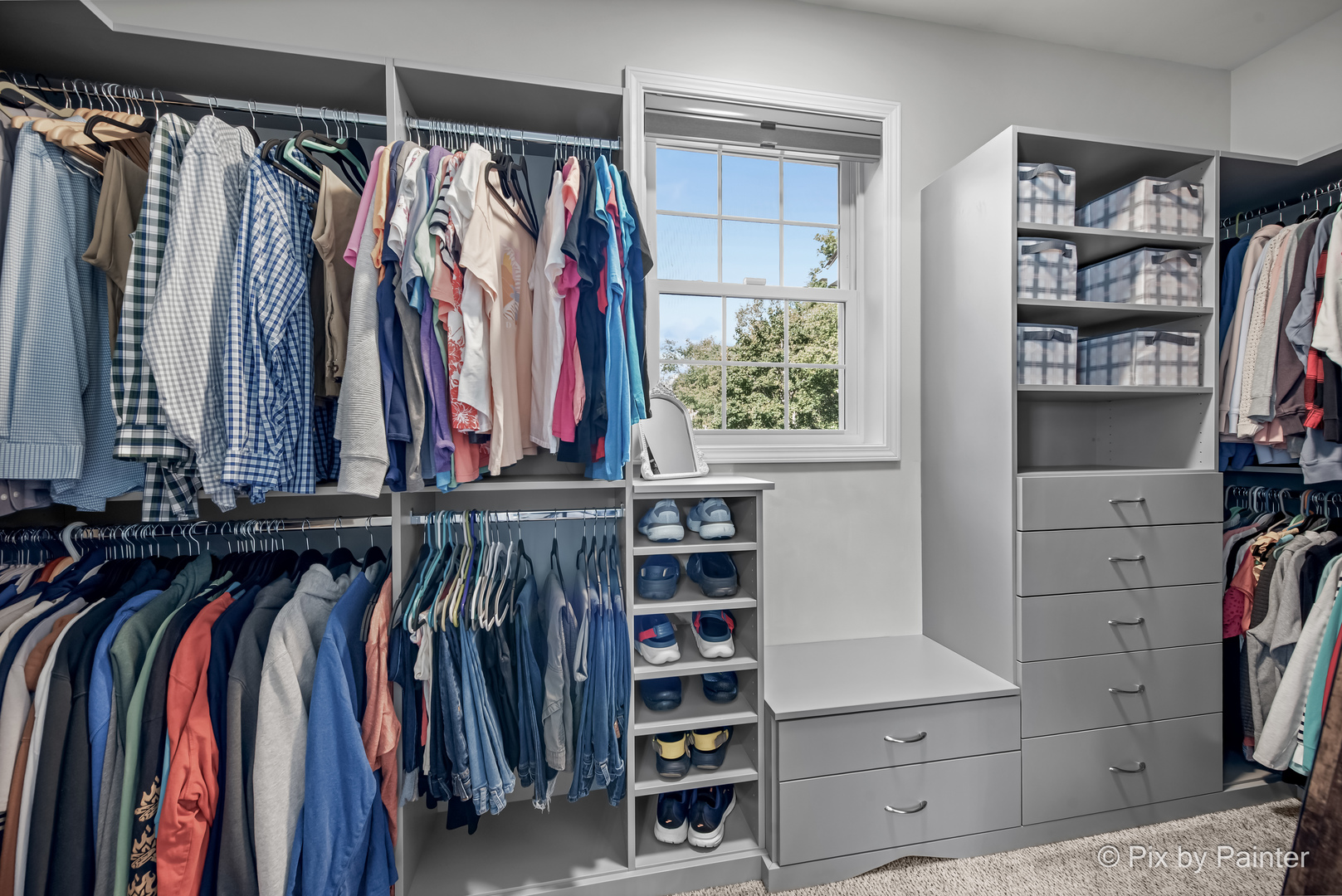 39247 Rangers Way Antioch, IL 60002 - Photo 29 of 53 a view of walk in closet with clothes and shoes
