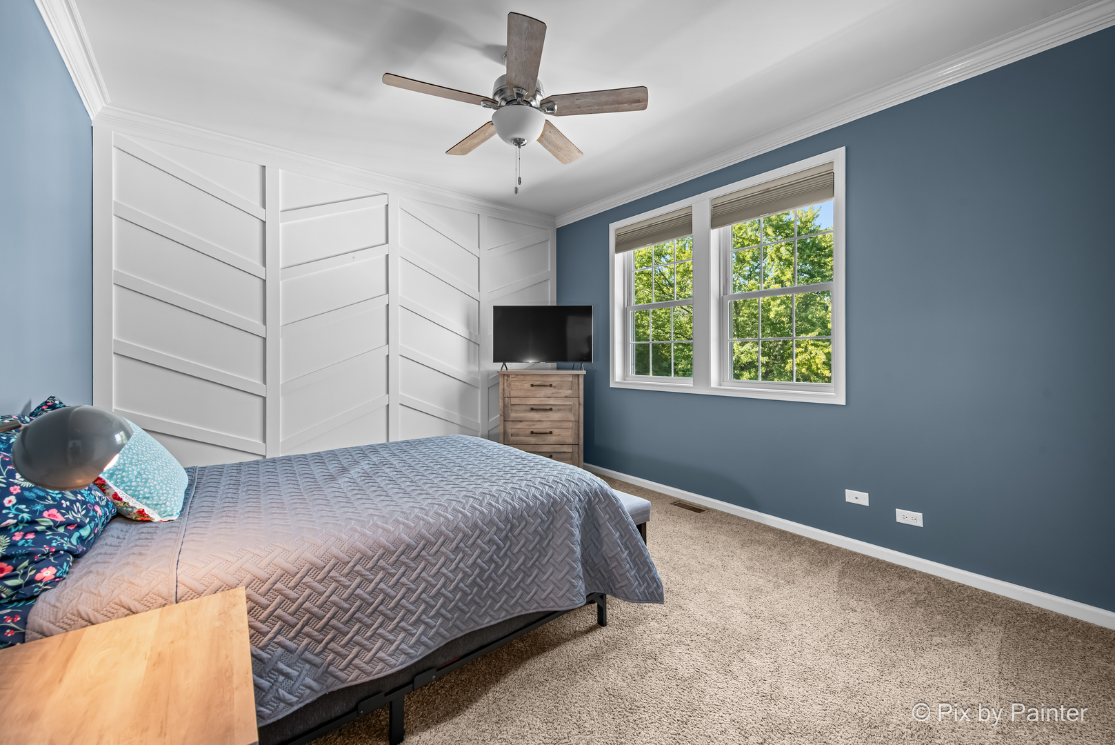 39247 Rangers Way Antioch, IL 60002 - Photo 34 of 53 a bedroom with a bed and a ceiling fan