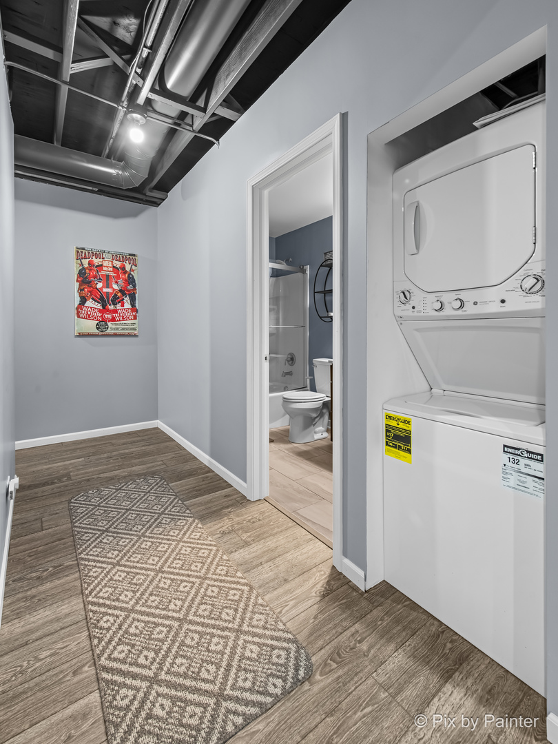 39247 Rangers Way Antioch, IL 60002 - Photo 48 of 53 a view of a livingroom with wooden floor and a flat screen tv