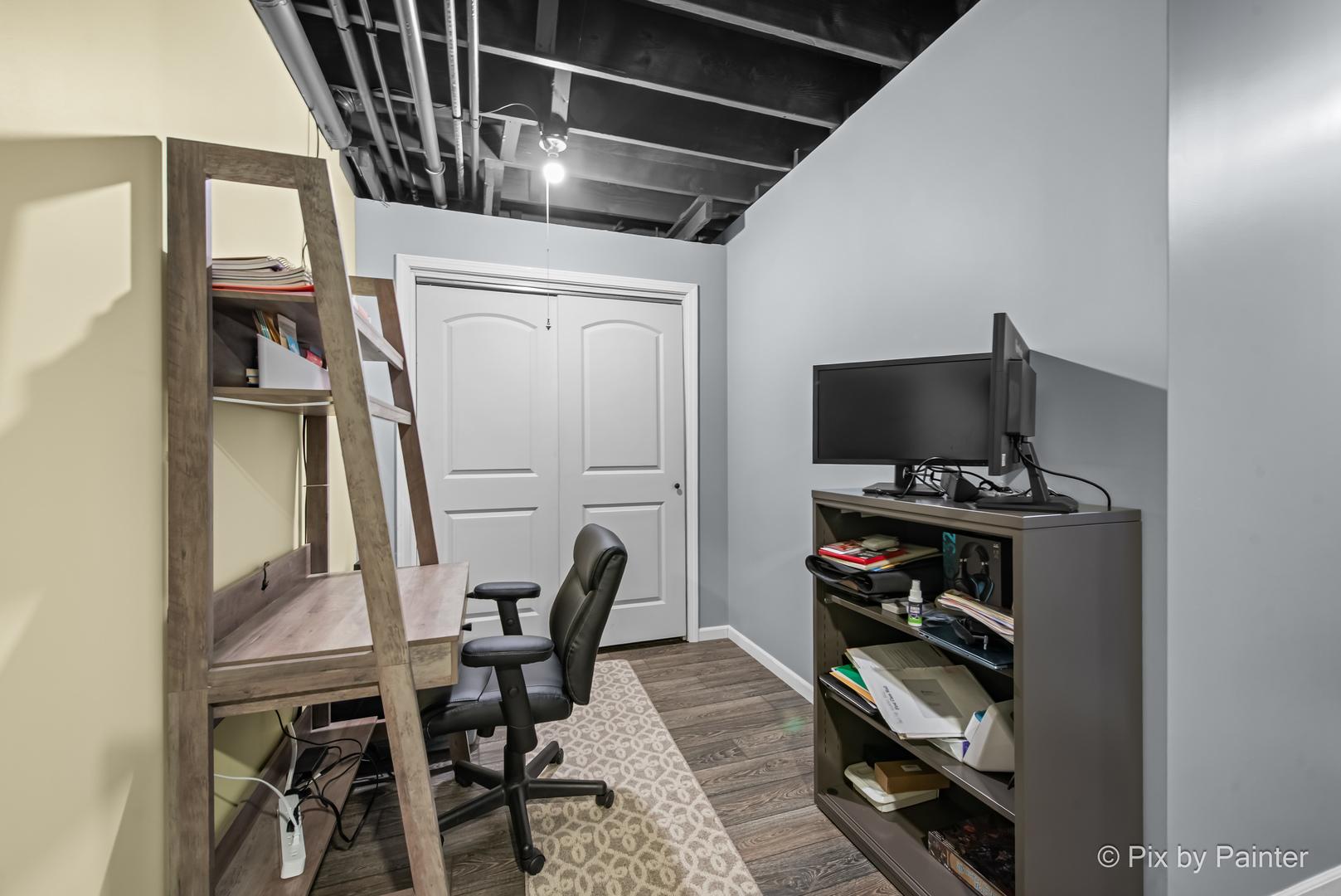 39247 Rangers Way Antioch, IL 60002 - Photo 49 of 53 a view of a workspace with furniture and wooden floor