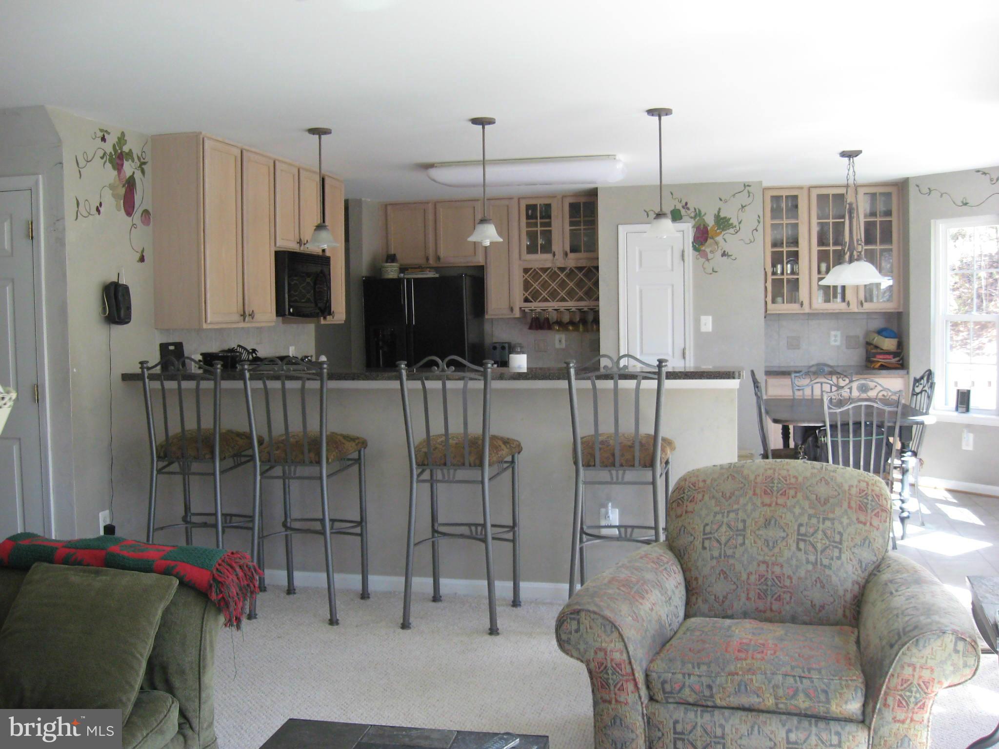 1806 Rudolph Lane Lusby, MD 20657 - Photo 8 of 23 Open space - view of kitchen from family room