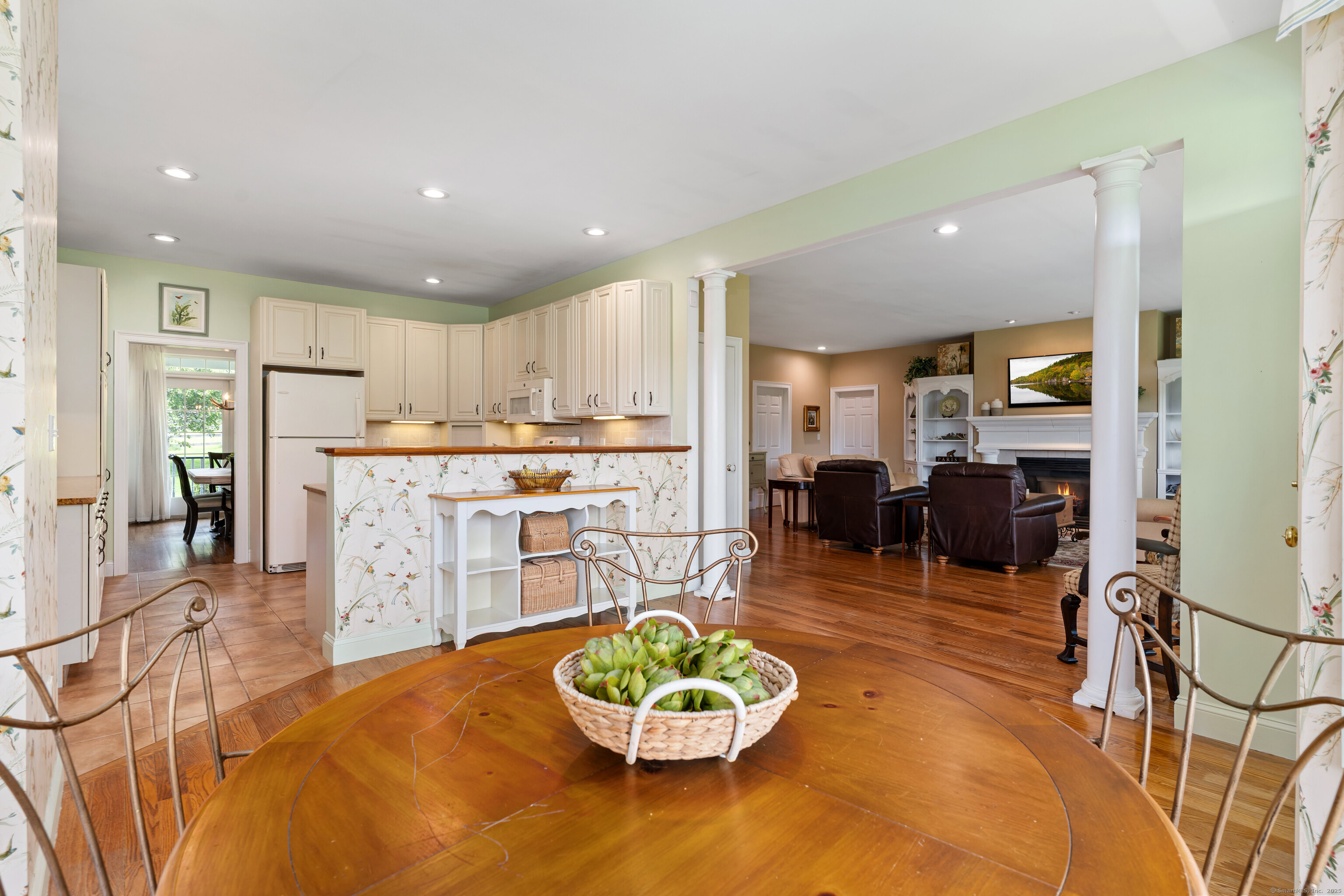 66-86 Bebbington Road Ashford, CT 06278 - Photo 10 of 39 a living room with stainless steel appliances kitchen island granite countertop furniture and a view of kitchen