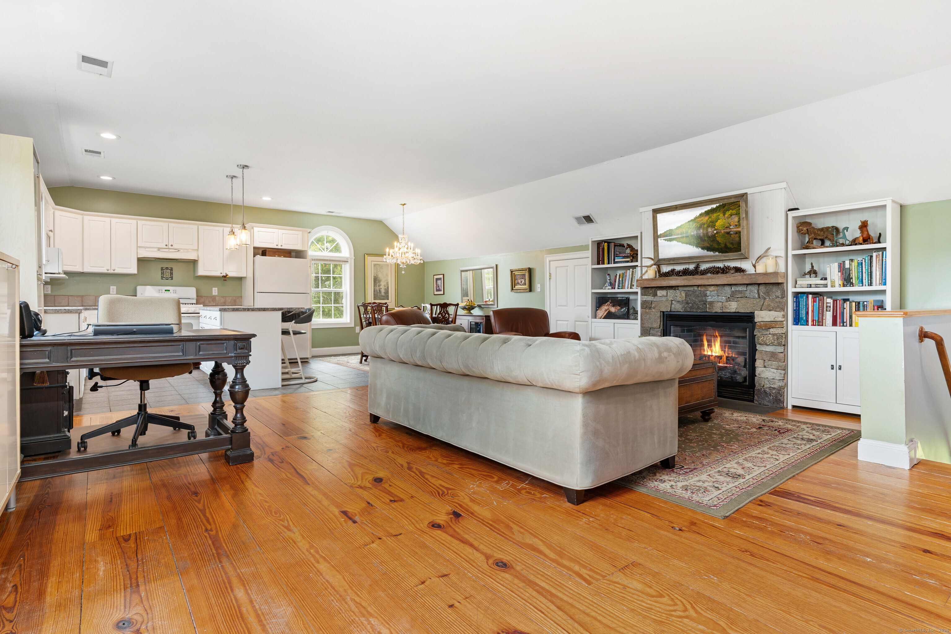66-86 Bebbington Road Ashford, CT 06278 - Photo 18 of 39 a living room with furniture and a fireplace