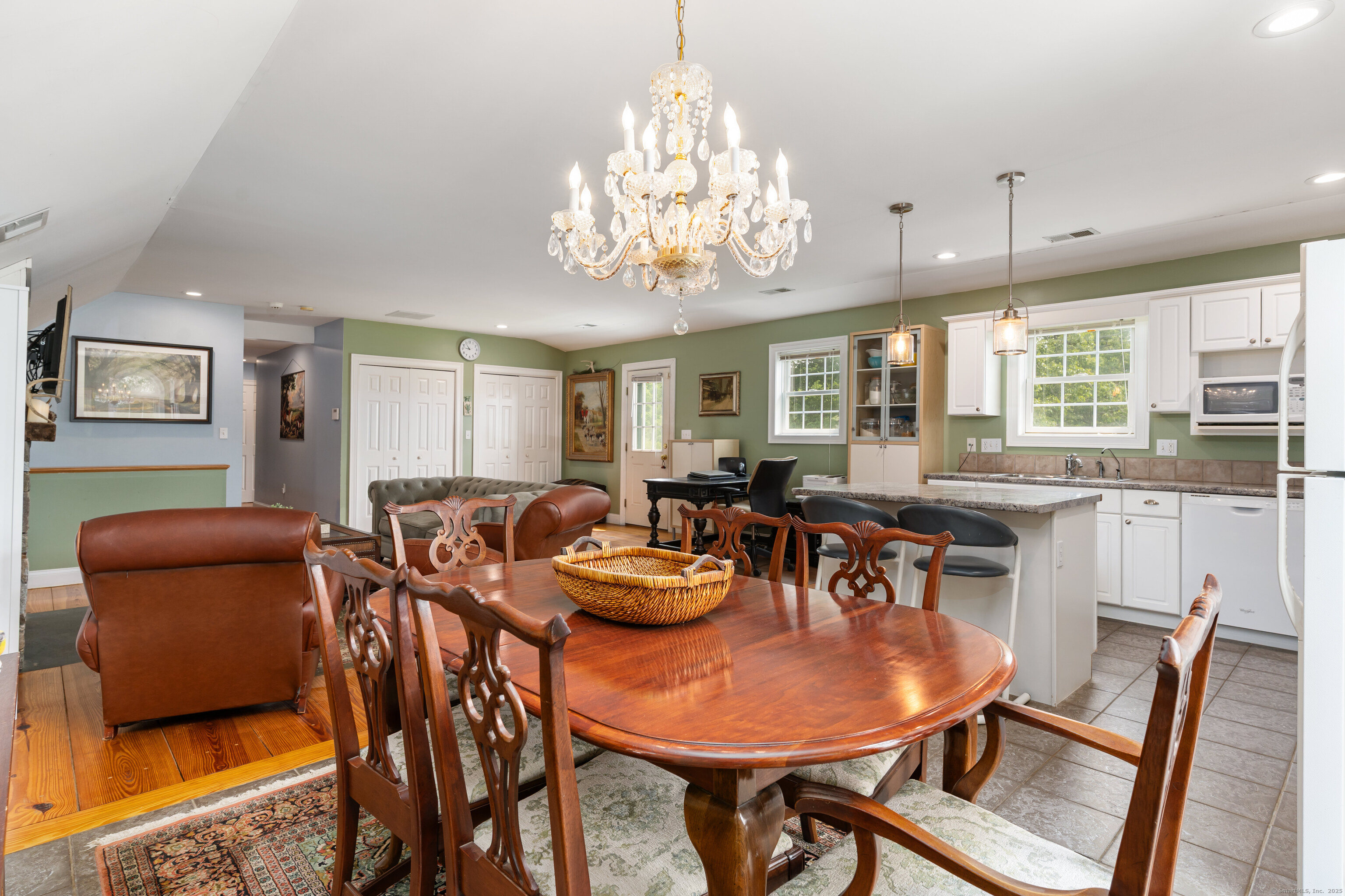 66-86 Bebbington Road Ashford, CT 06278 - Photo 19 of 39 a view of a dining room with furniture and chandelier