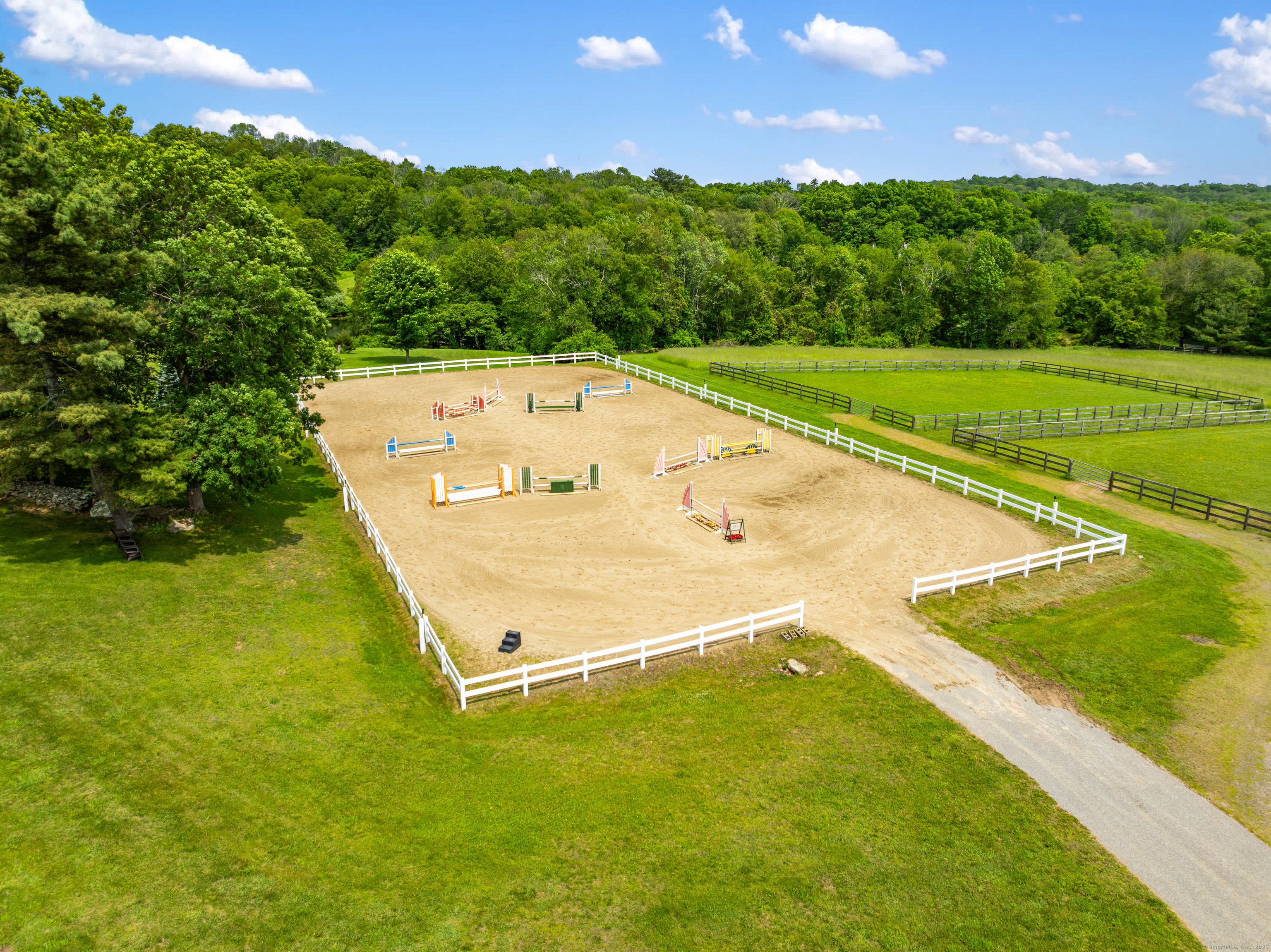 66-86 Bebbington Road Ashford, CT 06278 - Photo 28 of 39 a view of a big yard with an outdoor and seating area